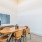 Spacious meeting room with large table 